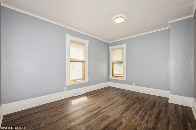 925 Laurel St, Des Moines, IA 50314 - spare room with crown molding and dark wood-style flooring