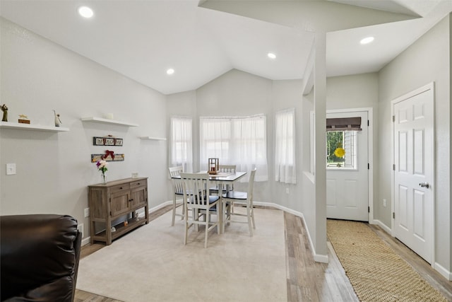 410 Sheridan St, Menlo, IA 50164 - dining room featuring light wood finished floors, recessed lighting, and vaulted ceiling
