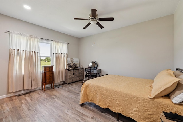 410 Sheridan St, Menlo, IA 50164 - bedroom featuring light wood-type flooring, ceiling fan, and recessed lighting