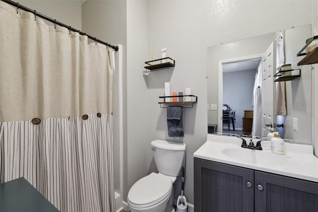 410 Sheridan St, Menlo, IA 50164 - full bath featuring vanity, a textured wall, and curtained shower