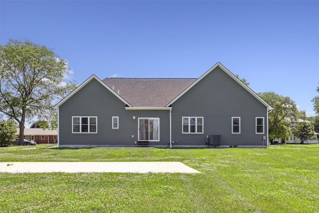 410 Sheridan St, Menlo, IA 50164 - back of property with a lawn and a shingled roof
