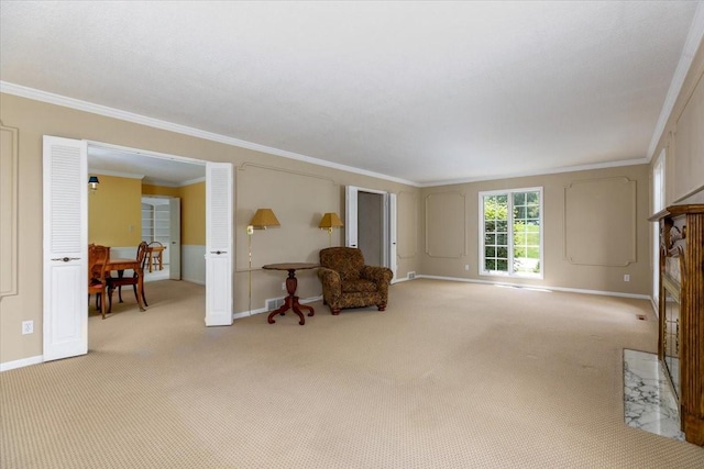 7819 Luin Ln, Windsor Heights, IA 50324 - sitting room with crown molding, carpet floors, and a high end fireplace