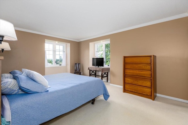 7819 Luin Ln, Windsor Heights, IA 50324 - bedroom featuring ornamental molding and light carpet