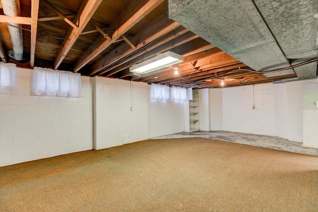 7819 Luin Ln, Windsor Heights, IA 50324 - below grade area featuring carpet floors