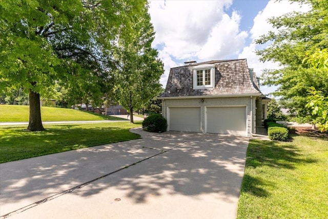 7819 Luin Ln, Windsor Heights, IA 50324 - view of front facade featuring mansard roof, concrete driveway, and a front yard