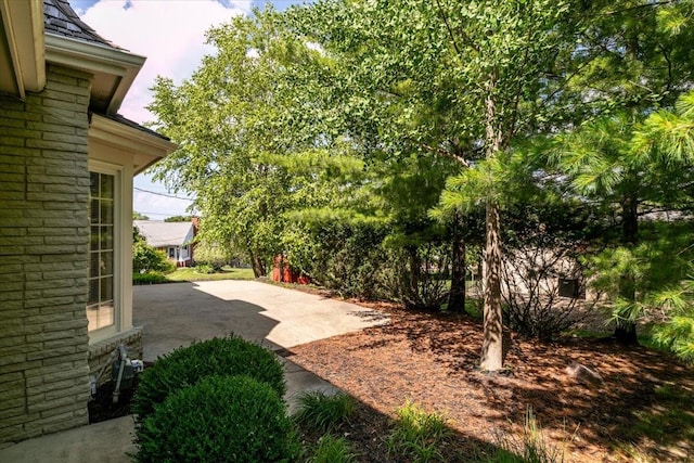 7819 Luin Ln, Windsor Heights, IA 50324 - view of yard with a patio area