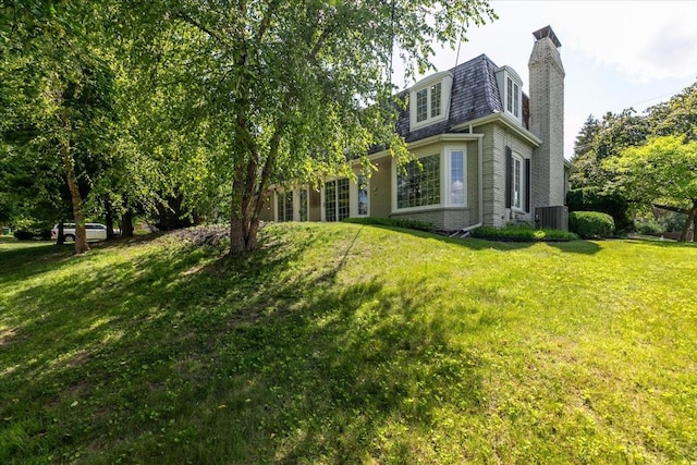 7819 Luin Ln, Windsor Heights, IA 50324 - view of green lawn