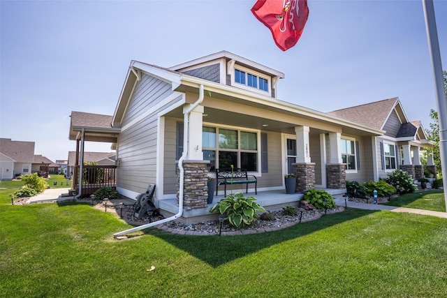 2801 SW Prairie Trail Pkwy, Ankeny, IA 50023 - view of front of home featuring a porch and a front yard