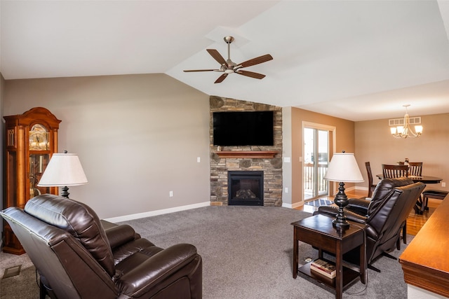 2801 SW Prairie Trail Pkwy, Ankeny, IA 50023 - carpeted living room with a chandelier, ceiling fan, a stone fireplace, and vaulted ceiling