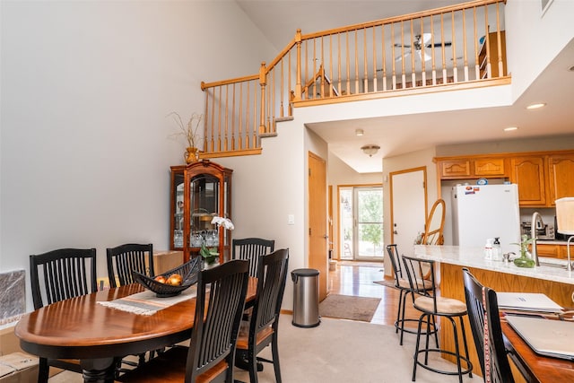1745 Waters Edge Dr, Pleasant Hill, IA 50327 - dining space with high vaulted ceiling and recessed lighting