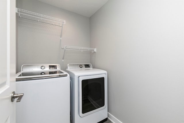 15321 Goldenrod Dr, Urbandale, IA 50323 - washroom featuring independent washer and dryer
