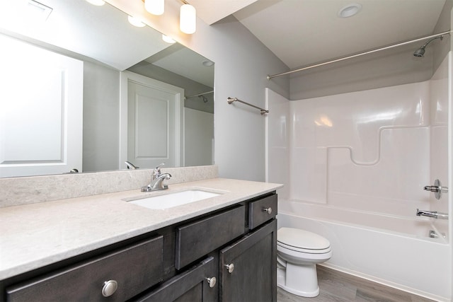15321 Goldenrod Dr, Urbandale, IA 50323 - bathroom featuring vanity, wood finished floors, and bathtub / shower combination