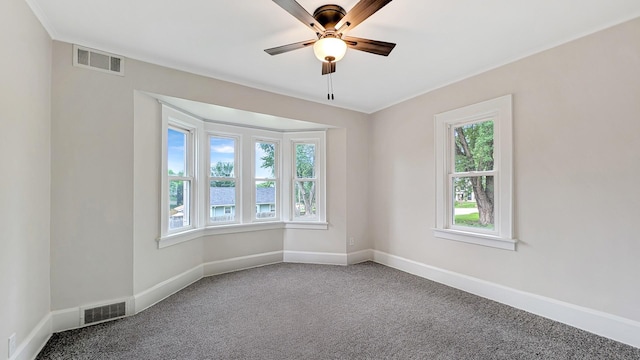 343 58th St, Des Moines, IA 50312 - carpeted empty room featuring ceiling fan, a water view, and crown molding