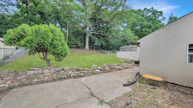 343 58th St, Des Moines, IA 50312 - fenced yard with a patio