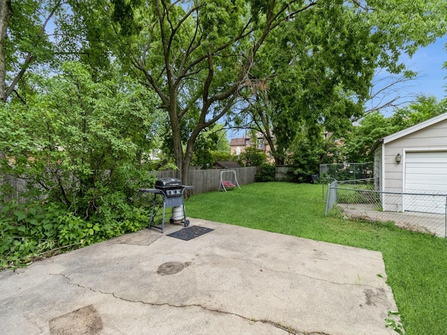 700 W Boston Ave, Indianola, IA 50125 - fenced backyard featuring area for grilling and a patio