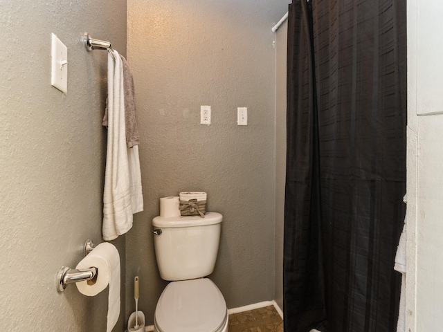 700 W Boston Ave, Indianola, IA 50125 - bathroom with toilet and curtained shower