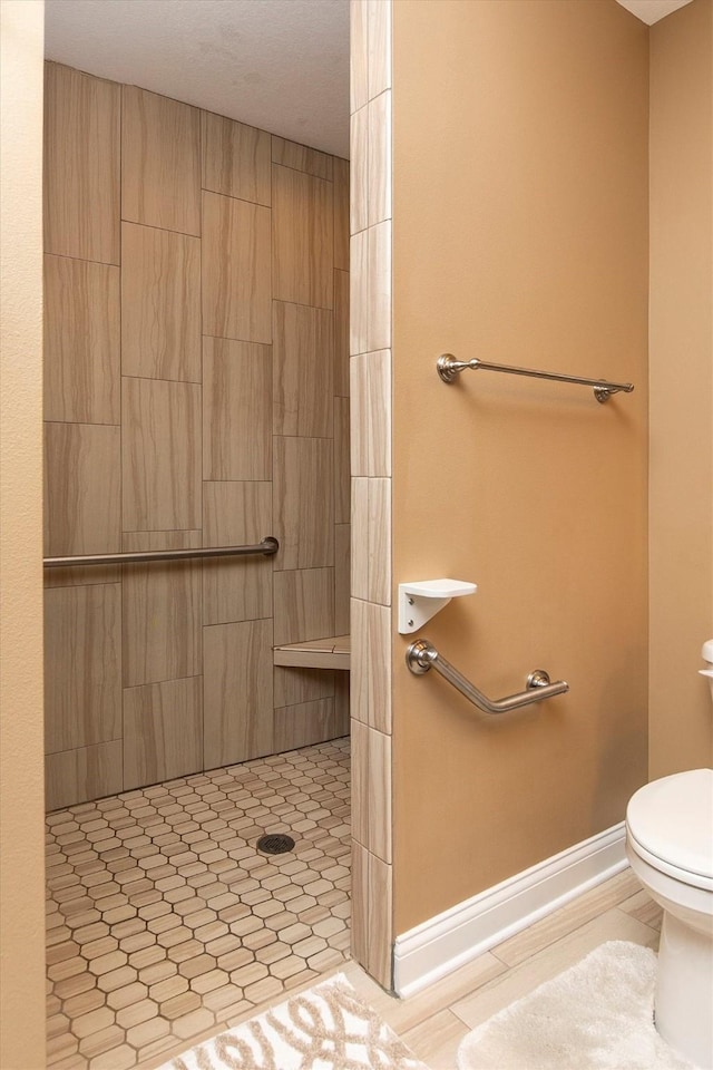 1592 SE Blackthorne Dr, Waukee, IA 50263 - bathroom with a tile shower and tile patterned floors
