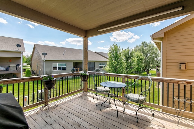1592 SE Blackthorne Dr, Waukee, IA 50263 - wooden deck with a lawn