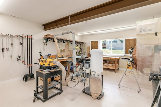 1592 SE Blackthorne Dr, Waukee, IA 50263 - below grade area featuring a workshop area and baseboards
