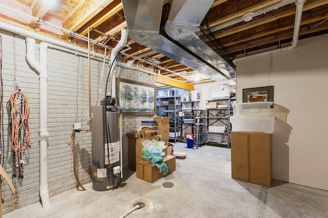 1592 SE Blackthorne Dr, Waukee, IA 50263 - unfinished below grade area featuring water heater and brick wall