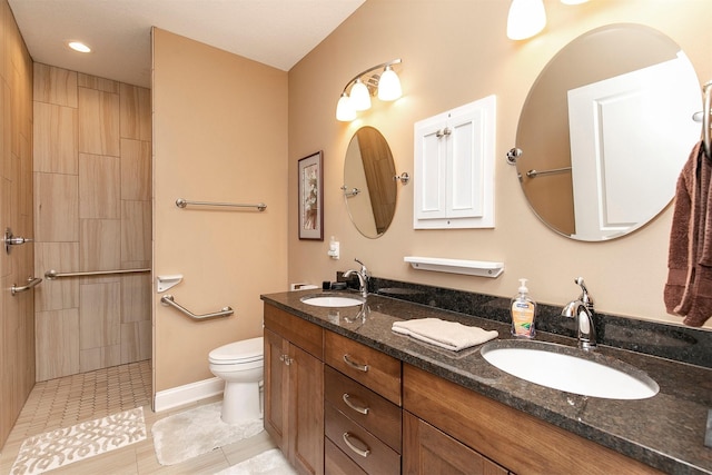 1592 SE Blackthorne Dr, Waukee, IA 50263 - full bathroom with double vanity, walk in shower, tile patterned flooring, and recessed lighting