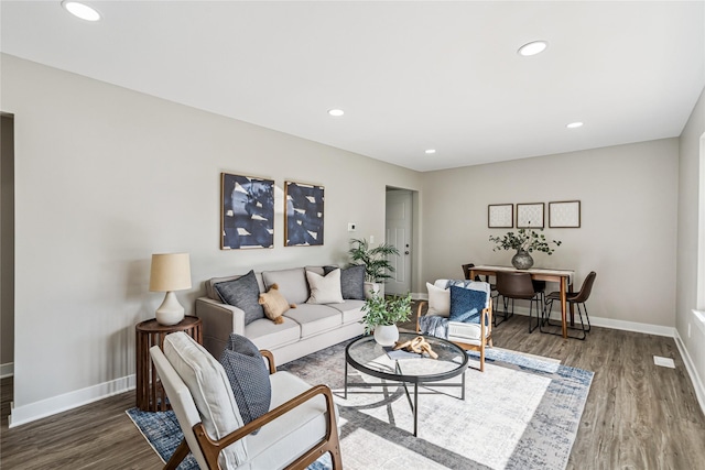 8066 Pilmer Dr, Des Moines, IA 50320 - living area with wood finished floors and recessed lighting