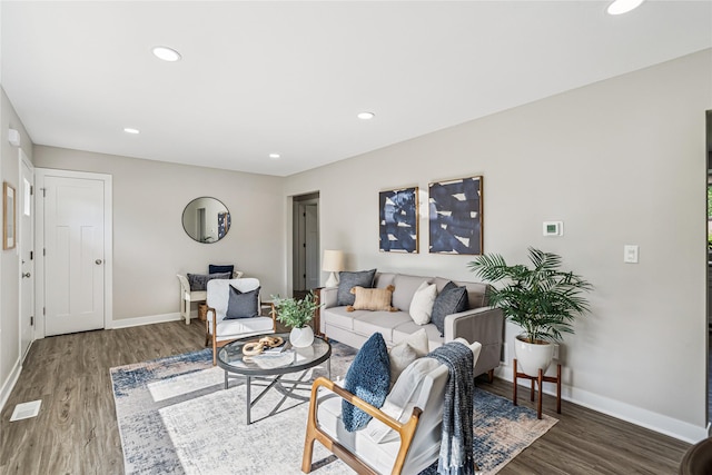 8066 Pilmer Dr, Des Moines, IA 50320 - living area with wood finished floors and recessed lighting