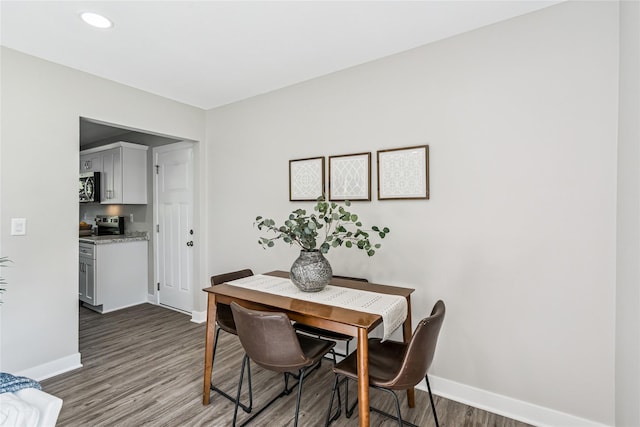 8066 Pilmer Dr, Des Moines, IA 50320 - dining area featuring wood finished floors and recessed lighting