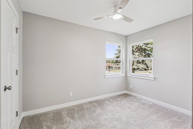 8066 Pilmer Dr, Des Moines, IA 50320 - carpeted empty room with baseboards and ceiling fan