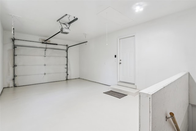 8066 Pilmer Dr, Des Moines, IA 50320 - garage with a garage door opener