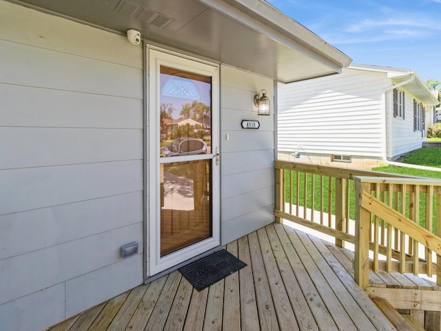 4518 SE 6th St, Des Moines, IA 50315 - view of exterior entry featuring a surveillance system