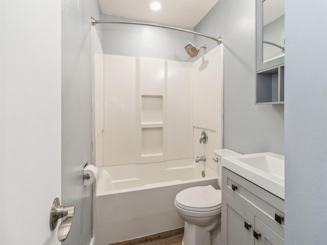 4518 SE 6th St, Des Moines, IA 50315 - full bath with shower / bath combination, vanity, and wood finished floors