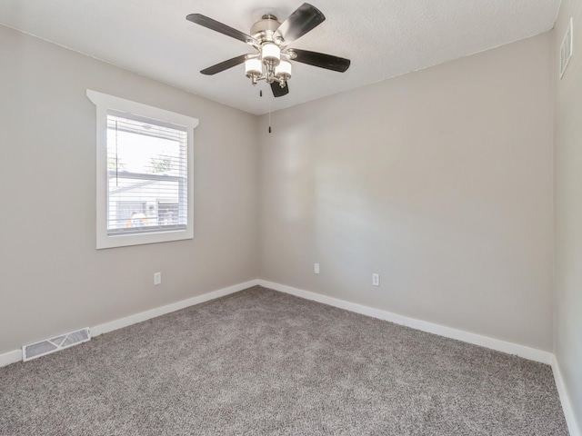 4518 SE 6th St, Des Moines, IA 50315 - carpeted empty room with a ceiling fan and baseboards