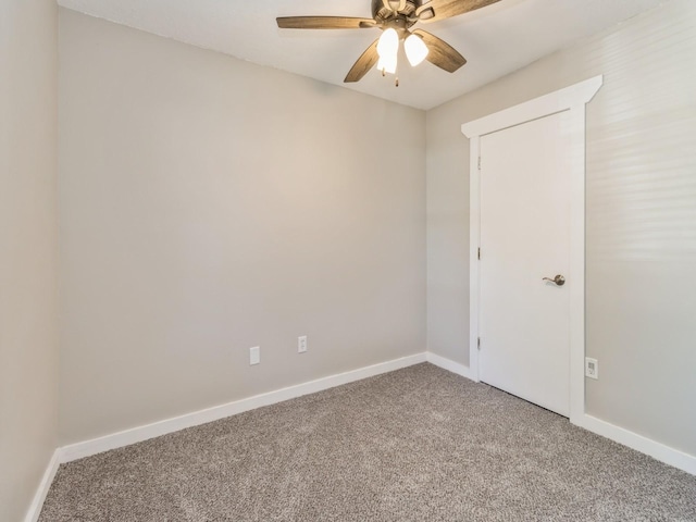 4518 SE 6th St, Des Moines, IA 50315 - carpeted empty room featuring a ceiling fan and baseboards