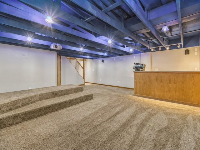 4518 SE 6th St, Des Moines, IA 50315 - finished basement featuring stairway, carpet, and bar area
