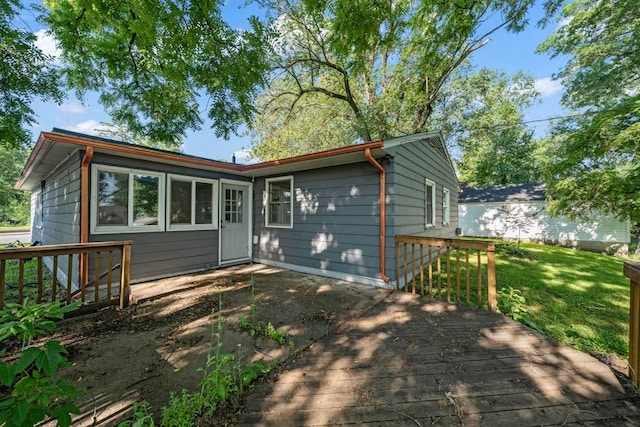 3017 Lincoln Way, Ames, IA 50014 - rear view of property featuring a deck