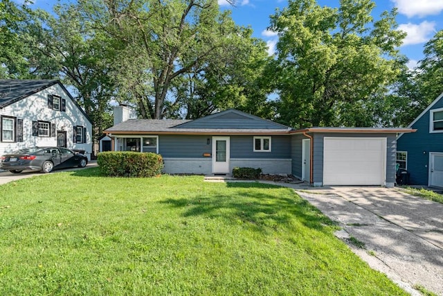 3017 Lincoln Way, Ames, IA 50014 - view of front facade with a garage, driveway, a front lawn, and a chimney
