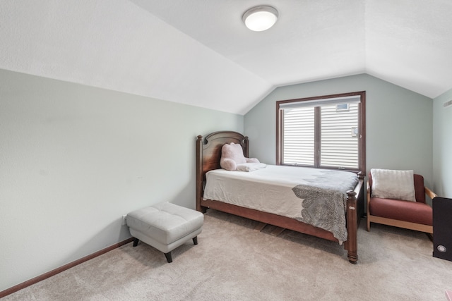 3124 Greenwood Rd, Ames, IA 50014 - carpeted bedroom featuring lofted ceiling