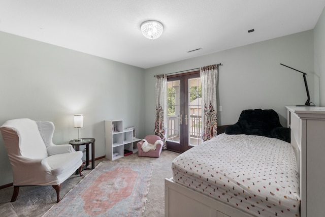 3124 Greenwood Rd, Ames, IA 50014 - bedroom with light colored carpet, access to outside, and french doors