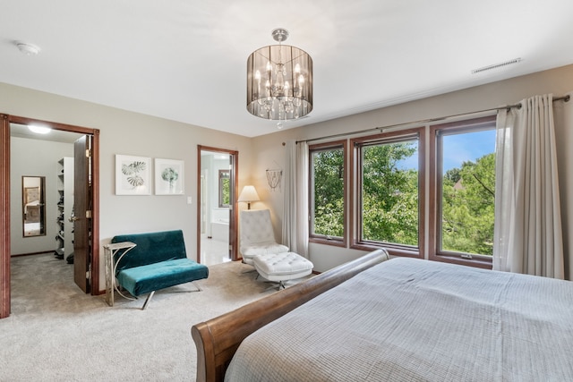 3124 Greenwood Rd, Ames, IA 50014 - carpeted bedroom with a chandelier