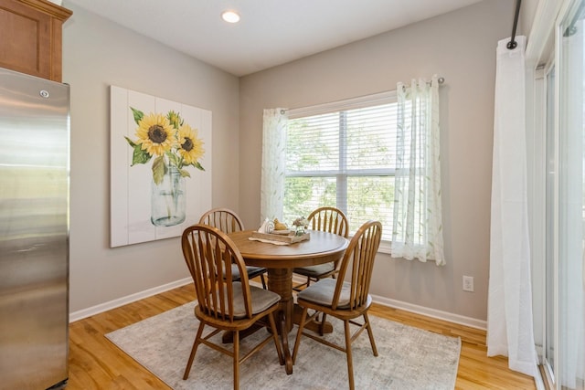 1921 Bristol St, Norwalk, IA 50211 - dining space featuring light wood-type flooring and recessed lighting
