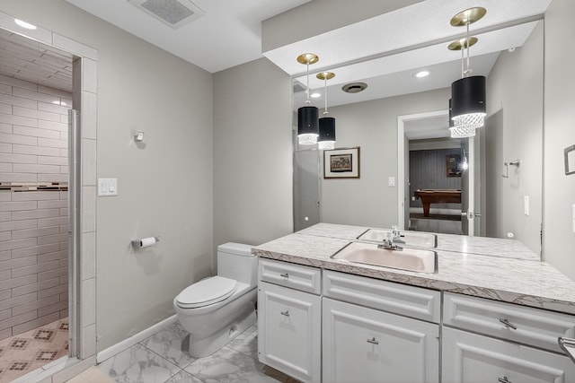 4130 Beaver Ave, Des Moines, IA 50310 - bathroom with vanity, marble finish flooring, and a shower stall