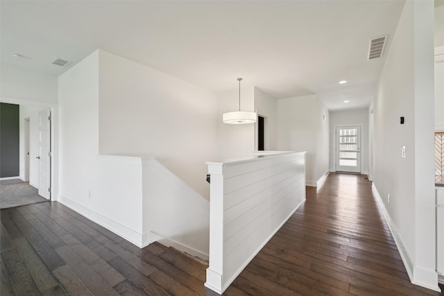 1824 Bentley Ct, Norwalk, IA 50211 - hallway featuring an upstairs landing, dark wood-style floors, and recessed lighting