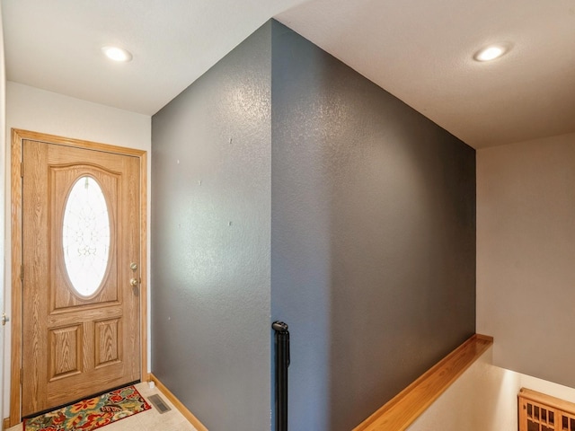 815 W 6th St S, Newton, IA 50208 - entryway featuring recessed lighting and baseboards