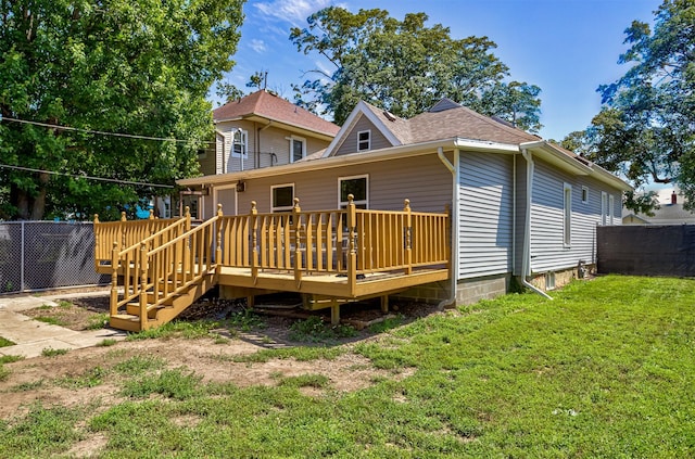 1718 Otley Ave, Perry, IA 50220 - back of house featuring a deck and roof with shingles