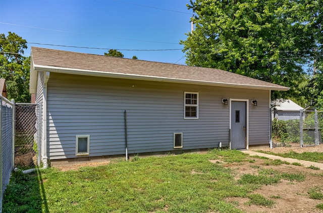 1718 Otley Ave, Perry, IA 50220 - rear view of house with roof with shingles