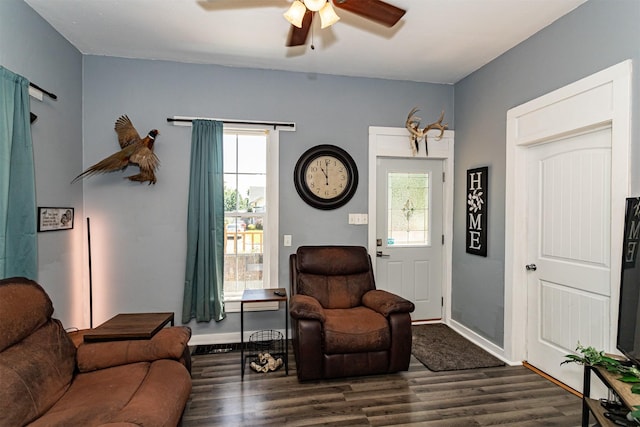 1718 Otley Ave, Perry, IA 50220 - living room with wood finished floors and a ceiling fan