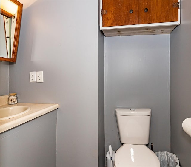 1718 Otley Ave, Perry, IA 50220 - bathroom featuring vanity and toilet