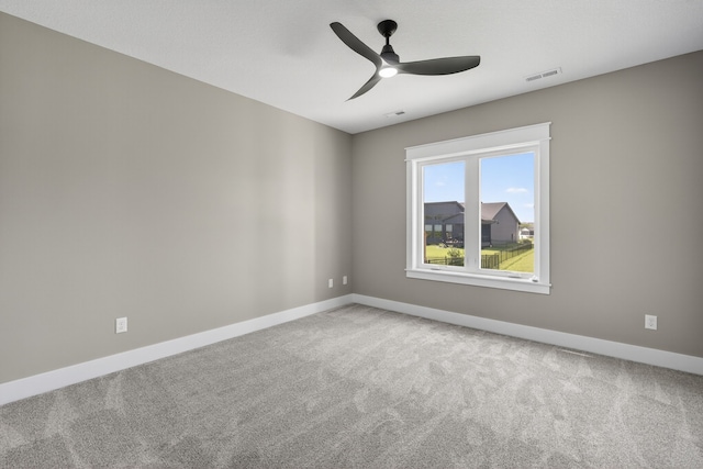 17736 Hammontree Dr, Clive, IA 50325 - carpeted empty room featuring baseboards and a ceiling fan