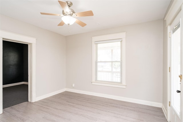 2124 E 23rd St, Des Moines, IA 50317 - unfurnished room featuring light wood-type flooring and a ceiling fan